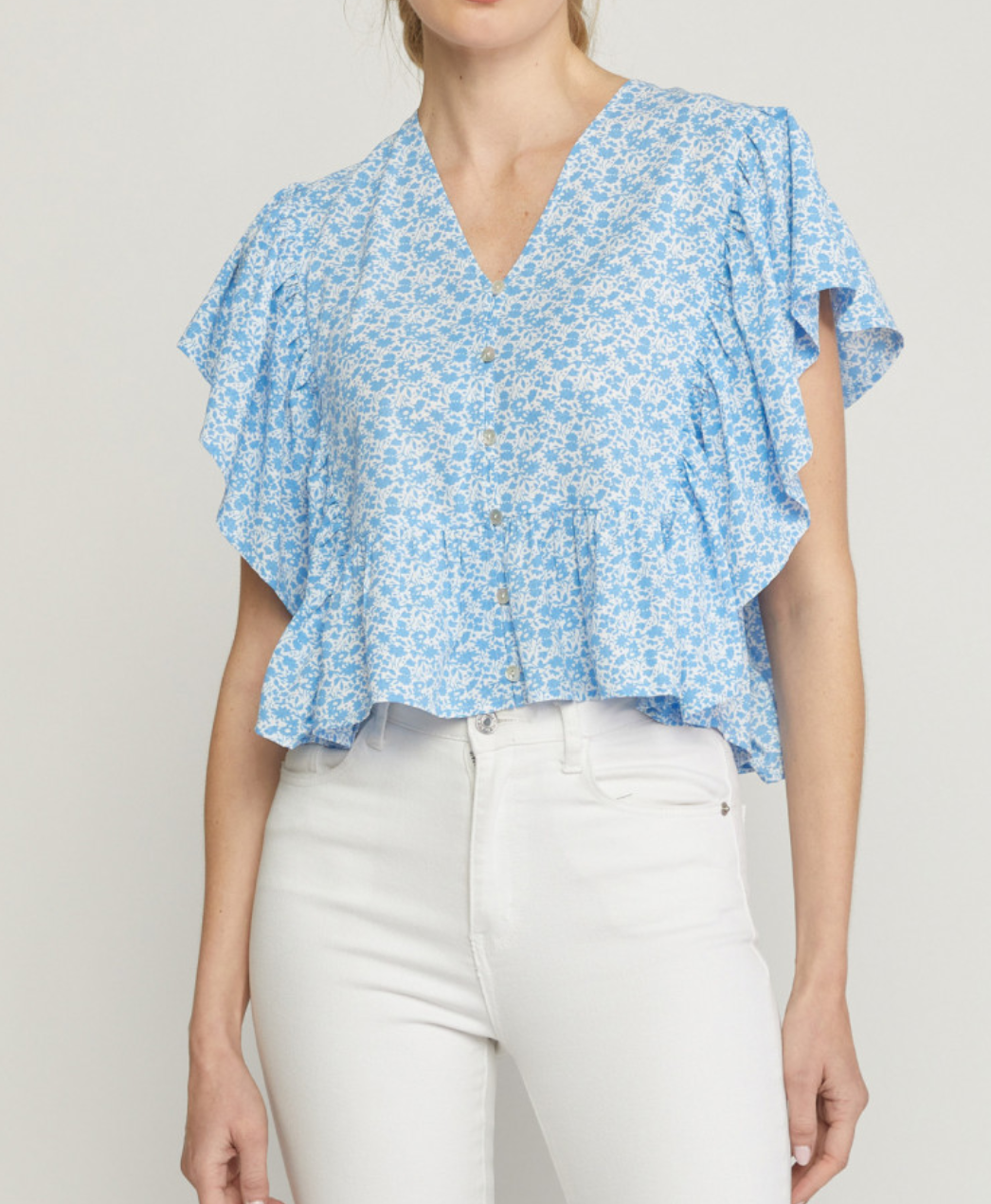 Blue and white ruffle sales top